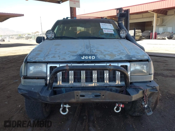 1994 Jeep Grand Cherokee Laredo with VIN 1J4GZ58S4RC280650, listed as a IAAI auction lot 42041261 with 199,265 mi miles and . Bid and sale history available at DreamBid. Image 12.