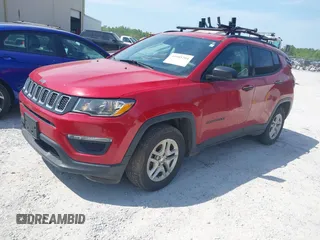 2018 Jeep Compass Sport with VIN 3C4NJCABXJT502717, listed as a IAAI auction lot 41985204 with 124,900 mi miles and . Bid and sale history available at DreamBid. Image 2.