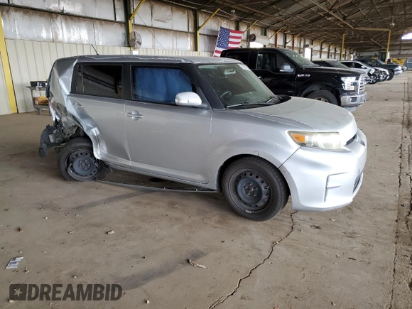 2012 Scion xB with VIN JTLZE4FE5CJ023537, listed as a Copart auction lot 55863315 with 230,648 mi miles and Salvage Title. Bid and sale history available at DreamBid. Image 4.