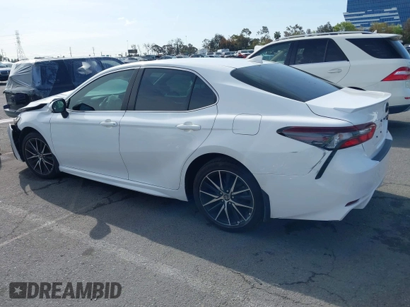 2022 Toyota Camry SE with VIN 4T1G11AKXNU070473, listed as a IAAI auction lot 41937541 with 57,598 mi miles and . Bid and sale history available at DreamBid. Image 14.