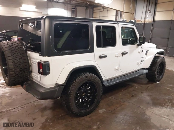 2018 Jeep Wrangler Unlimited Sahara with VIN 1C4HJXEG6JW280522, listed as a IAAI auction lot 41608108 with 104,748 mi miles. Bid and sale history available at carsss.com. Image 4.