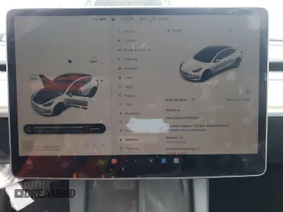 2023 Tesla Model 3 z VIN 5YJ3E1EA1PF561521, wystawiony jako Copart lot #55637855 z przebiegiem 83 008 mil mil oraz Szkoda całkowita • Salvage title. Historia ofert i sprzedaży dostępna na DreamBid. Obrazek 9.