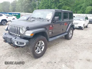 2018 Jeep Wrangler Unlimited Sahara with VIN 1C4HJXEN8JW303023, listed as a IAAI auction lot 42138631 with 72,463 mi miles and . Bid and sale history available at DreamBid. Image 18.
