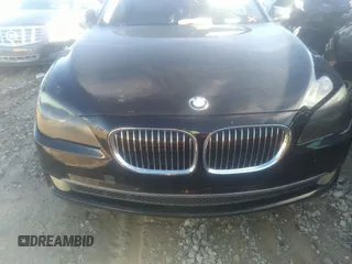 2011 BMW 7 Series 740i with VIN WBAKA4C55BC612634, listed as a IAAI auction lot 35404385 with 156,003 mi miles. Bid and sale history available at carsss.com. Image 6.