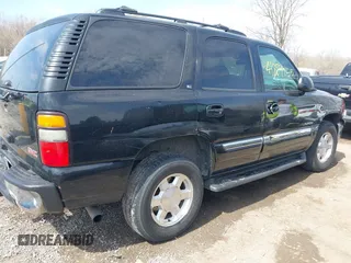 2005 GMC Yukon SLT with VIN 1GKEK13TX5R274020, listed as a IAAI auction lot 41889445 with 209,132 mi miles. Bid and sale history available at carsss.com. Image 6.