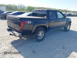 2011 GMC Canyon SLE1 with VIN 1GTH6MFE5B8104838, listed as a IAAI auction lot 42120959 with 188,277 mi miles. Bid and sale history available at carsss.com. Image 4.