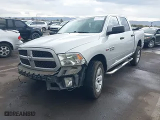 2014 Ram 1500 Tradesman with VIN 1C6RR6KT4ES305348, listed as a IAAI auction lot 41458464 with 1 mi miles. Bid and sale history available at carsss.com. Image 2.