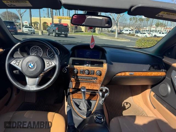 2009 BMW 6 Series 650i with VIN WBAEB53599CX58223, listed as a Copart auction lot 46720505 with 62,044 mi miles and Salvage Title. Bid and sale history available at carsss.com. Image 9.