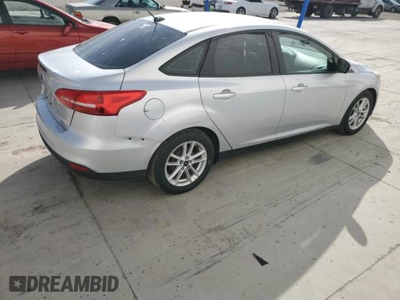 2016 Ford Focus SE with VIN 1FADP3F28GL270003, listed as a Copart auction lot 51852715 with 157,665 mi miles and Salvage Title. Bid and sale history available at DreamBid. Image 3.