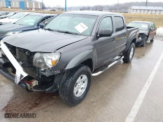 2011 Toyota Tacoma with VIN 3TMLU4ENXBM062437, listed as a IAAI auction lot 41458901 with 182,275 mi miles. Bid and sale history available at carsss.com. Image 2.