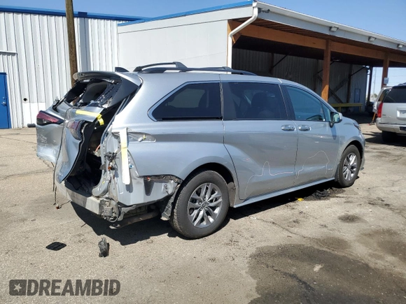 2021 Toyota Sienna XLE with VIN 5TDYSKFC6MS033078, listed as a Copart auction lot 52763265 with 59,599 mi miles and Salvage Title. Bid and sale history available at DreamBid. Image 3.