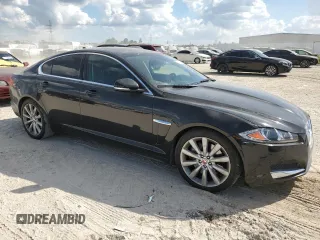 2014 Jaguar XF SC with VIN SAJWA0EX2E8U21886, listed as a Copart auction lot 76783344 with 97,280 mi miles and Salvage Title. Bid and sale history available at DreamBid. Image 4.