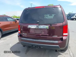 2011 Honda Pilot EX-L with VIN 5FNYF4H59BB090116, listed as a IAAI auction lot 42048811 with 158,857 mi miles and . Bid and sale history available at carsss.com. Image 15.