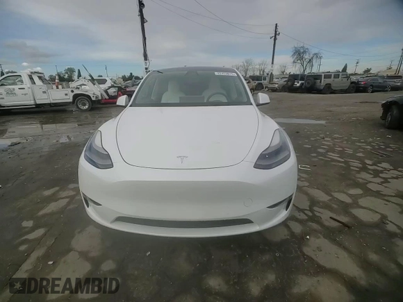 2021 Tesla Model Y Performance with VIN 5YJYGDEF4MF201815, listed as a Copart auction lot 42453075 with 76,888 mi miles and Salvage Title. Bid and sale history available at DreamBid. Image 11.