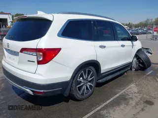 2019 Honda Pilot Touring 8-Passenger z VIN 5FNYF5H93KB021978, wystawiony jako IAAI lot #41915333 z przebiegiem 82 676 mil mil oraz . Historia ofert i sprzedaży dostępna na DreamBid. Obrazek 4.