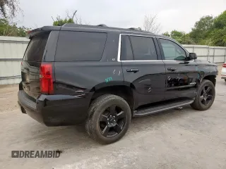 2020 Chevrolet Tahoe LT with VIN 1GNSCBKC5LR203301, listed as a Copart auction lot 57071315 with 106,376 mi miles and Salvage title. Bid and sale history available at DreamBid. Image 3.