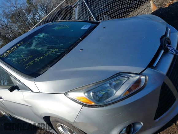 2012 Ford Focus SEL with VIN 1FAHP3M28CL162768, listed as a IAAI auction lot 41682973 with 999,999 mi miles. Bid and sale history available at carsss.com. Image 6.