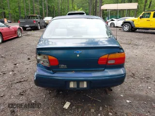 2000 Chevrolet Prizm LSi z VIN 1Y1SK5289YZ401584, wystawiony jako IAAI lot #42263210 z przebiegiem 151 567 mil mil oraz . Historia ofert i sprzedaży dostępna na DreamBid. Obrazek 16.
