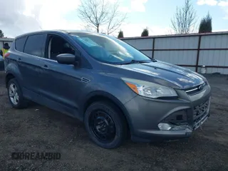 2013 Ford Escape SE with VIN 1FMCU9GX8DUC76686, listed as a IAAI auction lot 41809554 with 126,718 mi miles. Bid and sale history available at carsss.com. Image 1.
