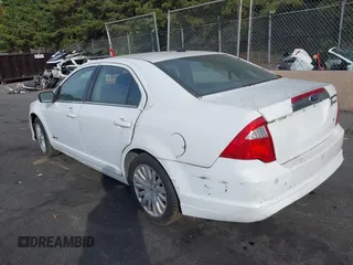 2012 Ford Fusion Hybrid with VIN 3FADP0L31CR380494, listed as a IAAI auction lot 40411832 with 81,452 mi miles and . Bid and sale history available at DreamBid. Image 3.