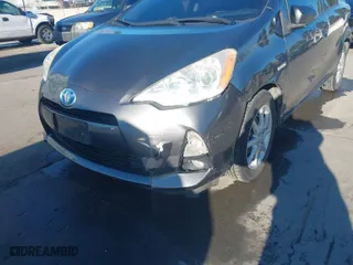 2012 Toyota Prius c One with VIN JTDKDTB34C1031059, listed as a IAAI auction lot 41624950 with 117,490 mi miles. Bid and sale history available at carsss.com. Image 6.