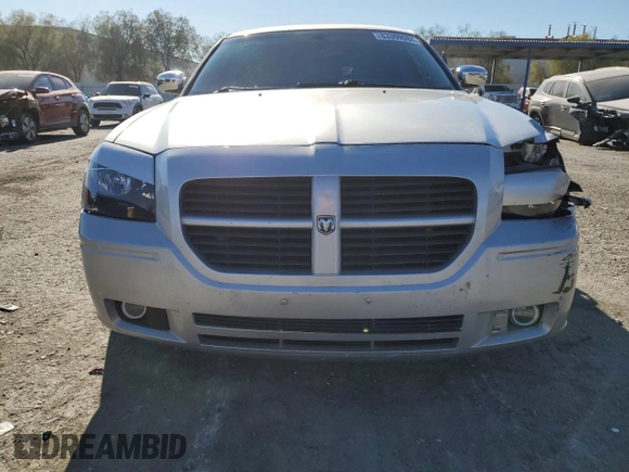 2006 Dodge Magnum R/T z VIN 2D8GV57286H122762, wystawiony jako Copart lot #83399984 z przebiegiem 200 443 mil mil oraz Szkody całkowita. Historia ofert i sprzedaży dostępna na DreamBid. Obrazek 5.