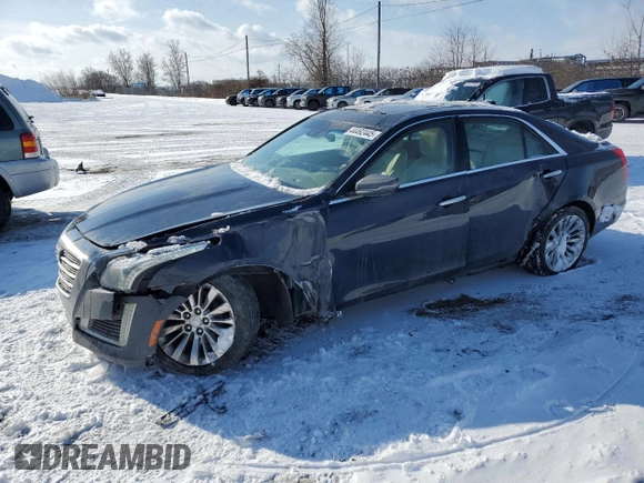 2015 Cadillac CTS Luxury AWD with VIN 1G6AX5SX5F0142864, listed as a Copart auction lot 44492445 with 87,199 mi miles and Salvage Title. Bid and sale history available at DreamBid. Image 1.