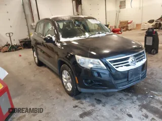 2011 Volkswagen Tiguan SE z VIN WVGBV7AX3BW513494, wystawiony jako IAAI lot #41392209 z przebiegiem 78 293 mil mil oraz . Historia ofert i sprzedaży dostępna na DreamBid. Obrazek 1.