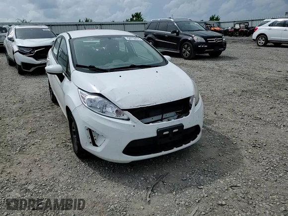 2013 Ford Fiesta S z VIN 3FADP4AJ5DM140467, wystawiony jako Copart lot #54718675 z przebiegiem 135 949 mil mil oraz Szkoda całkowita • Salvage title. Historia ofert i sprzedaży dostępna na DreamBid. Obrazek 13.