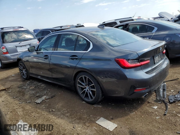 2019 BMW 3 Series 330i with VIN WBA5R1C55KAJ98853, listed as a Copart auction lot 50699315 with 101,110 mi miles and Salvage title. Bid and sale history available at DreamBid. Image 2.