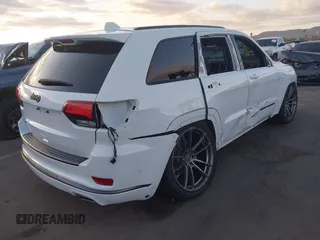 2018 Jeep Grand Cherokee Overland z VIN 1C4RJFCG7JC158464, wystawiony jako IAAI lot #42056386 z przebiegiem 94 608 mil mil oraz . Historia ofert i sprzedaży dostępna na DreamBid. Obrazek 4.