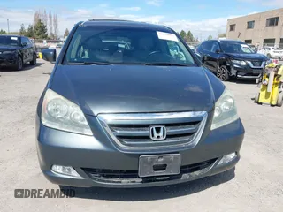 2005 Honda Odyssey TOURING with VIN 5FNRL38885B082482, listed as a IAAI auction lot 41879897 with 159,667 mi miles. Bid and sale history available at carsss.com. Image 12.