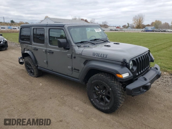 2022 Jeep Wrangler Unlimited Willys with VIN 1C4HJXDN7NW156538, listed as a Copart auction lot 79195464 with 87,081 mi miles and Salvage Title. Bid and sale history available at DreamBid. Image 4.