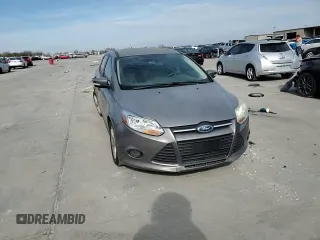 2013 Ford Focus SE z VIN 1FADP3F25DL149392, wystawiony jako Copart lot #82422434 z przebiegiem 169 525 mil mil oraz Szkody całkowita. Historia ofert i sprzedaży dostępna na DreamBid. Obrazek 11.