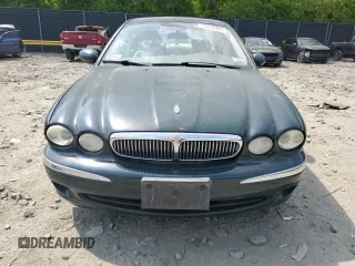 2004 Jaguar X-Type with VIN SAJEA51C64WE17722, listed as a Copart auction lot 55416405 with 89,047 mi miles and Salvage Title. Bid and sale history available at DreamBid. Image 5.