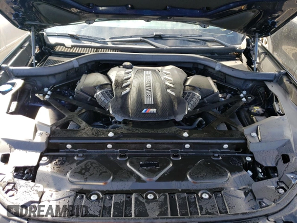 2021 BMW X5 M z VIN 5YMJU0C02M9E48899, wystawiony jako Copart lot #62313822 z przebiegiem 18 708 mil mil oraz . Historia ofert i sprzedaży dostępna na DreamBid. Obrazek 7.