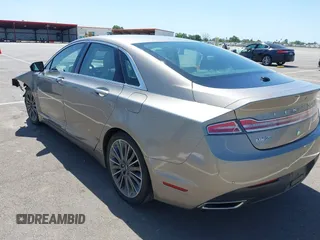2016 Lincoln MKZ Hybrid with VIN 3LN6L2LU8GR613310, listed as a IAAI auction lot 41986892 with 114,087 mi miles. Bid and sale history available at carsss.com. Image 3.