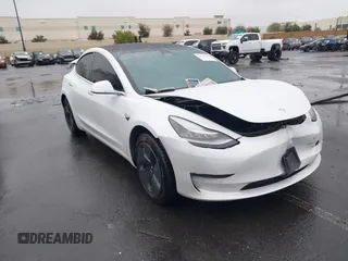 2020 Tesla Model 3 Standard Range Plus with VIN 5YJ3E1EA2LF740225, listed as a IAAI auction lot 41781554 with 46,703 mi miles. Bid and sale history available at carsss.com. Image 1.