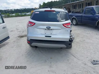 2014 Ford Escape SE with VIN 1FMCU9G9XEUD91390, listed as a IAAI auction lot 42561849 with 319,400 mi miles and . Bid and sale history available at DreamBid. Image 17.