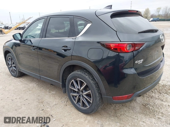 2018 Mazda CX-5 Grand Touring with VIN JM3KFBDM3J0384431, listed as a IAAI auction lot 42013474 with 65,018 mi miles. Bid and sale history available at carsss.com. Image 3.