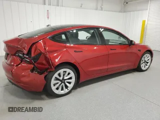 2023 Tesla Model 3 with VIN 5YJ3E1EA6PF455789, listed as a Copart auction lot 54715665 with 64,658 mi miles and Salvage Title. Bid and sale history available at DreamBid. Image 3.