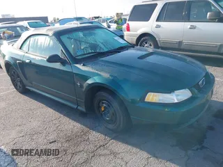 2000 Ford Mustang with VIN 1FAFP444XYF207441, listed as a IAAI auction lot 42120700 with 119,335 mi miles. Bid and sale history available at carsss.com. Image 1.
