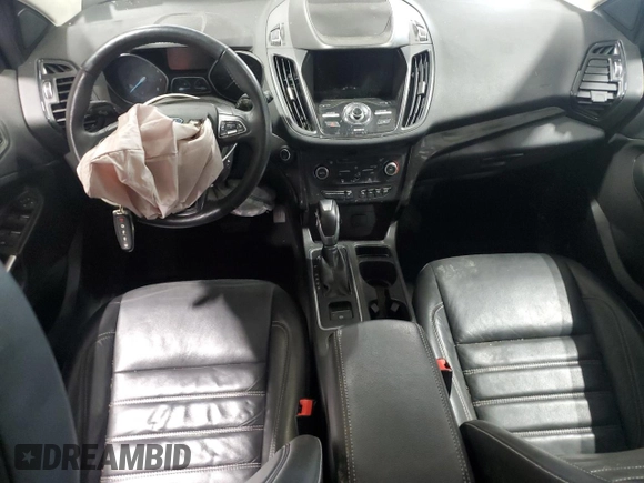 2019 Ford Escape Titanium z VIN 1FMCU9J97KUA85865, wystawiony jako Copart lot #56643135 z przebiegiem Nie podano mil oraz Szkoda całkowita • Salvage title. Historia ofert i sprzedaży dostępna na DreamBid. Obrazek 8.
