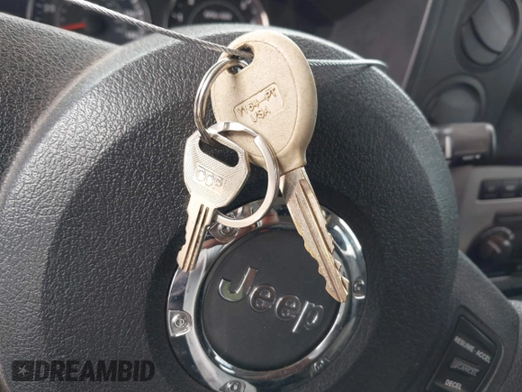 2006 Jeep Commander with VIN 1J8HG48K06C349008, listed as a IAAI auction lot 42084480 with 222,664 mi miles and . Bid and sale history available at DreamBid. Image 11.
