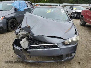2009 Mitsubishi Lancer ES with VIN JA3AU26U29U035822, listed as a Copart auction lot 69290484 with 207,560 mi miles and Salvage Title. Bid and sale history available at carsss.com. Image 5.