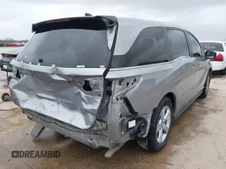 2018 Honda Odyssey EX-L with VIN 5FNRL6H73JB105024, listed as a IAAI auction lot 41663862 with 76,172 mi miles. Bid and sale history available at carsss.com. Image 4.