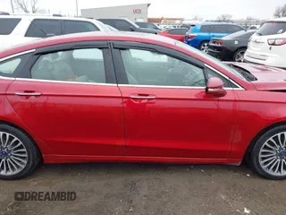 2017 Ford Fusion SE z VIN 3FA6P0H98HR175087, wystawiony jako IAAI lot #41557481 z przebiegiem 103 752 mil mil oraz . Historia ofert i sprzedaży dostępna na DreamBid. Obrazek 13.