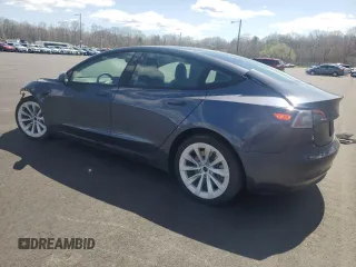 2022 Tesla Model 3 Long Range with VIN 5YJ3E1EBXNF188596, listed as a Copart auction lot 51846915 with 49,271 mi miles and Non Repairable. Bid and sale history available at carsss.com. Image 2.