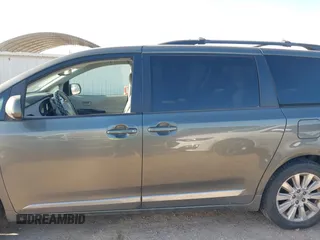 2012 Toyota Sienna LE with VIN 5TDJK3DCXCS039801, listed as a IAAI auction lot 41483248 with 165,548 mi miles. Bid and sale history available at carsss.com. Image 14.