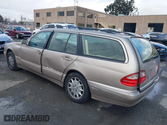 2001 Mercedes-Benz E-Class with VIN WDBJH65J41B349359, listed as a IAAI auction lot 41532318 with 96,375 mi miles. Bid and sale history available at carsss.com. Image 3.